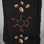 Detailansicht der Stickerei: Kaffeebohnen und Kaffeemolekül